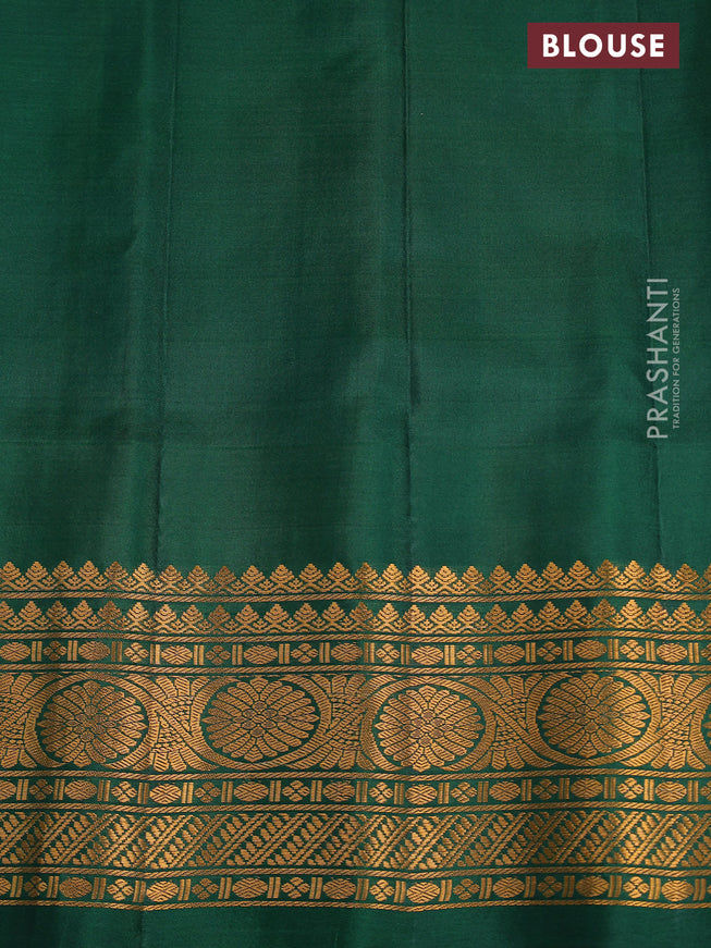 Pure gadwal silk saree orange and green with zari woven buttas and temple design zari woven border