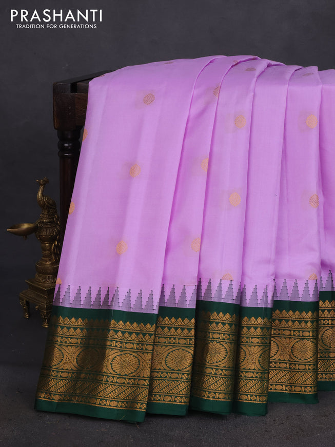 Pure gadwal silk saree lavender shade and green with zari woven buttas and temple design zari woven border