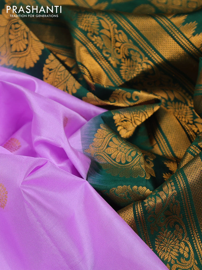 Pure gadwal silk saree lavender shade and green with zari woven buttas and temple design zari woven border