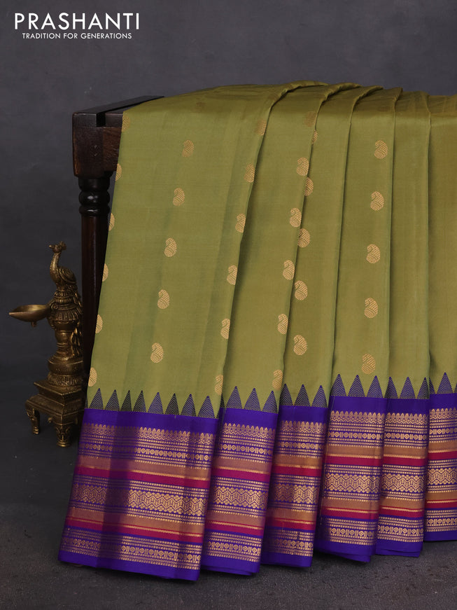 Pure gadwal silk saree mehendi green and blue with zari woven buttas and temple design zari woven border