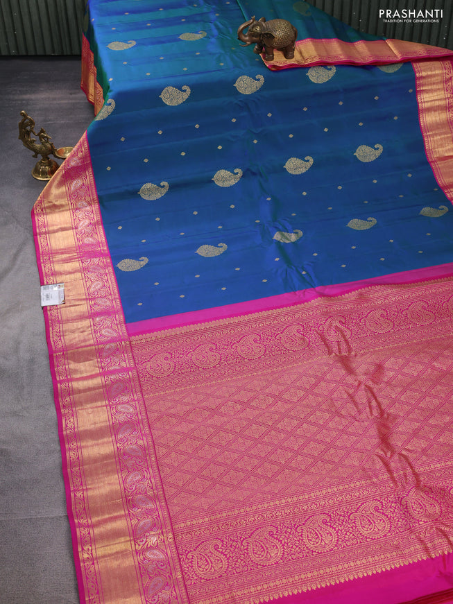 Pure gadwal silk saree dual shade of bluish green and pink with zari woven buttas and zari woven border