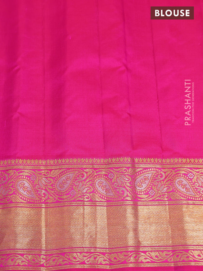 Pure gadwal silk saree dual shade of bluish green and pink with zari woven buttas and zari woven border