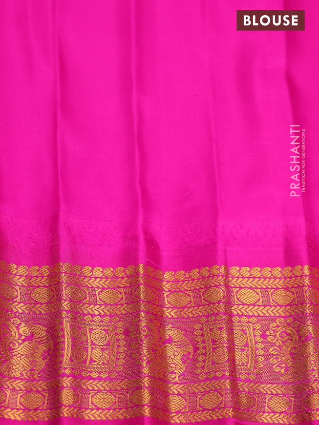 Pure gadwal silk saree gree and pink with zari woven buttas and temple design zari woven border