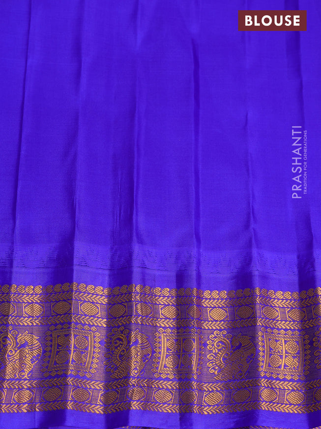 Pure gadwal silk saree light green and blue with zari woven buttas and temple design zari woven border