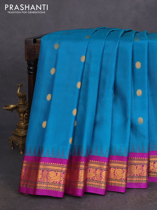 Pure gadwal silk saree teal blue and purple with zari woven buttas and temple design zari woven border