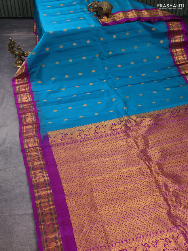 Pure gadwal silk saree teal blue and purple with zari woven buttas and temple design zari woven border