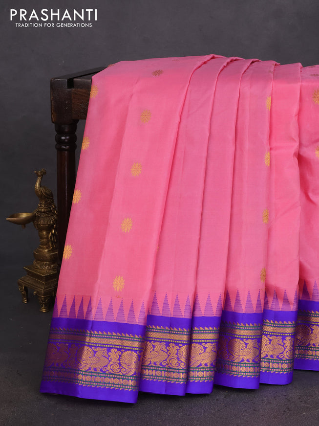 Pure gadwal silk saree light pink and blue with zari woven buttas and temple design zari woven border