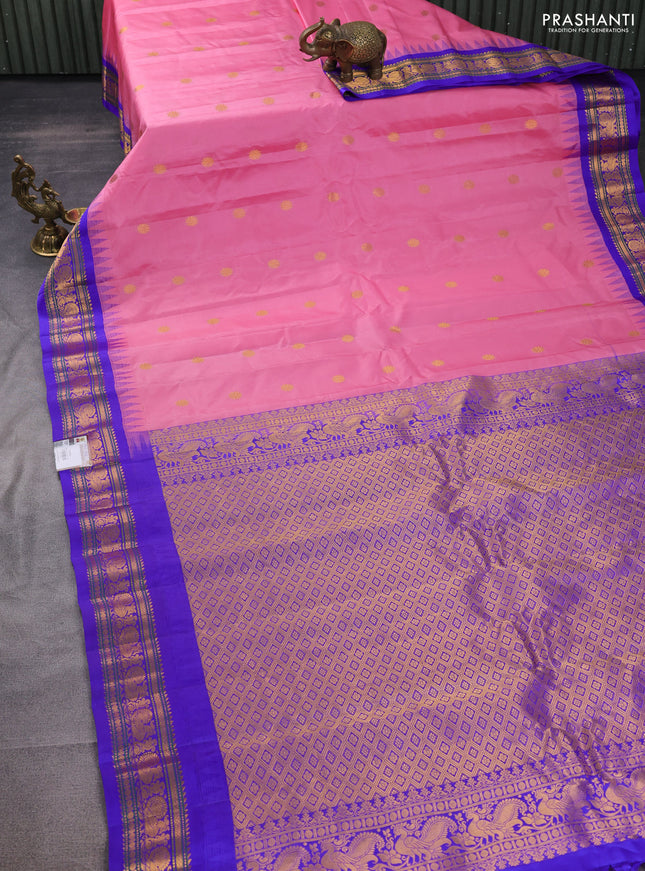 Pure gadwal silk saree light pink and blue with zari woven buttas and temple design zari woven border