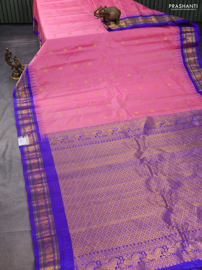 Pure gadwal silk saree light pink and blue with zari woven buttas and temple design zari woven border