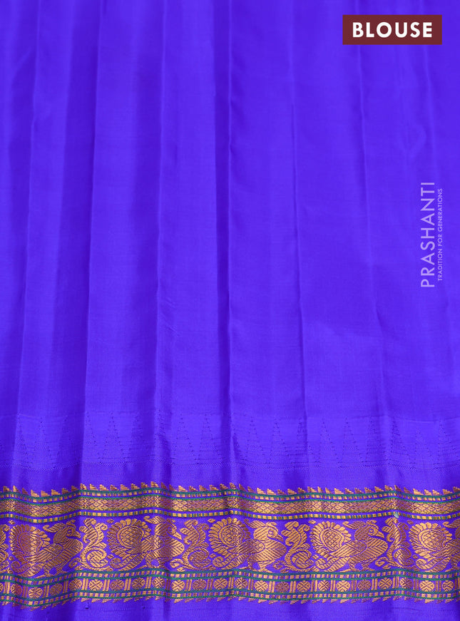 Pure gadwal silk saree light pink and blue with zari woven buttas and temple design zari woven border