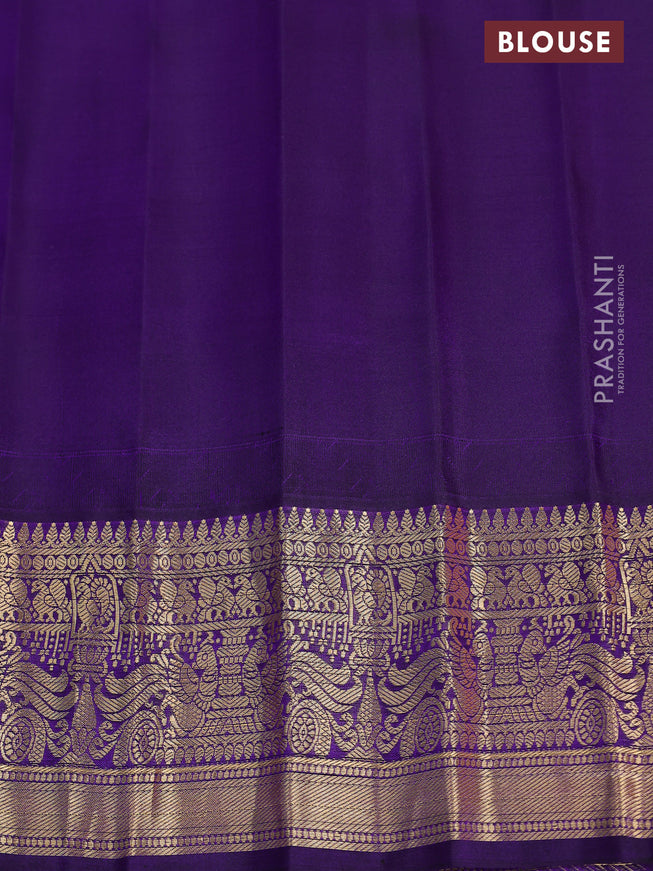 Pure gadwal silk saree dual shade of pinkish orange and deep violet with zari woven buttas and temple design zari woven border