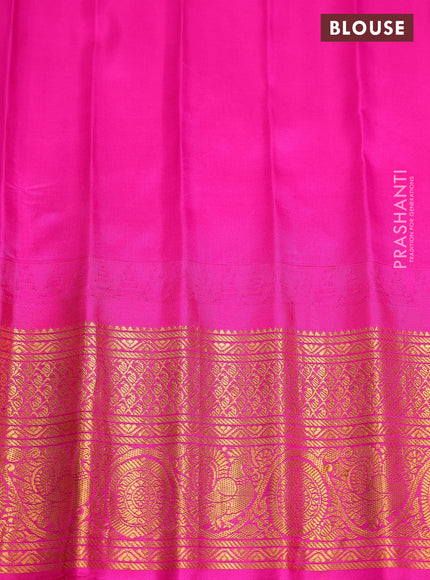 Pure gadwal silk saree blue and pink with zari woven buttas and temple design zari woven border