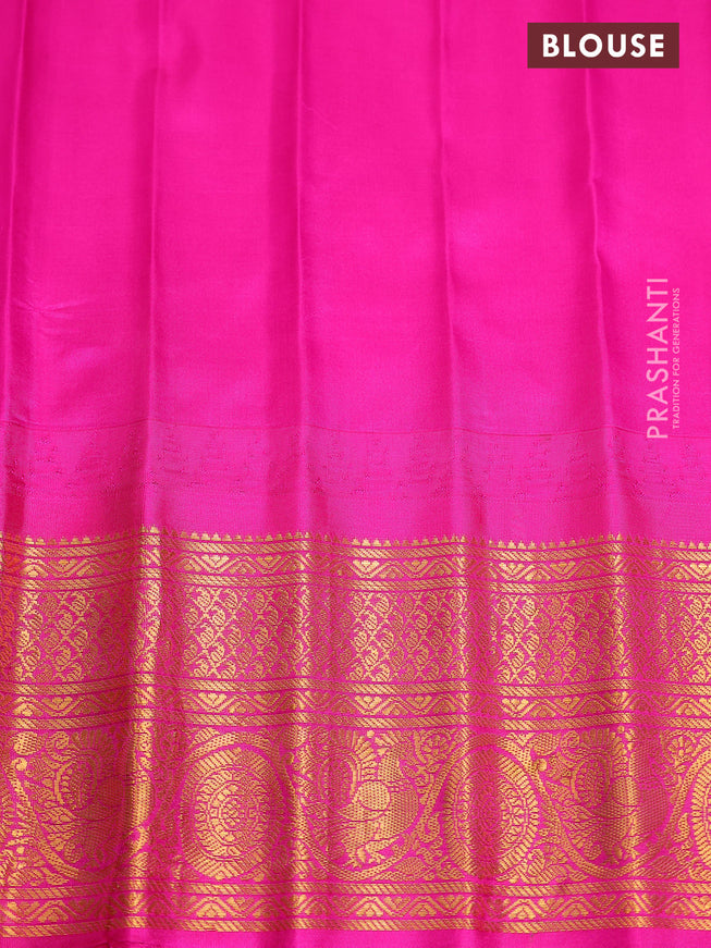 Pure gadwal silk saree blue and pink with zari woven buttas and temple design zari woven border
