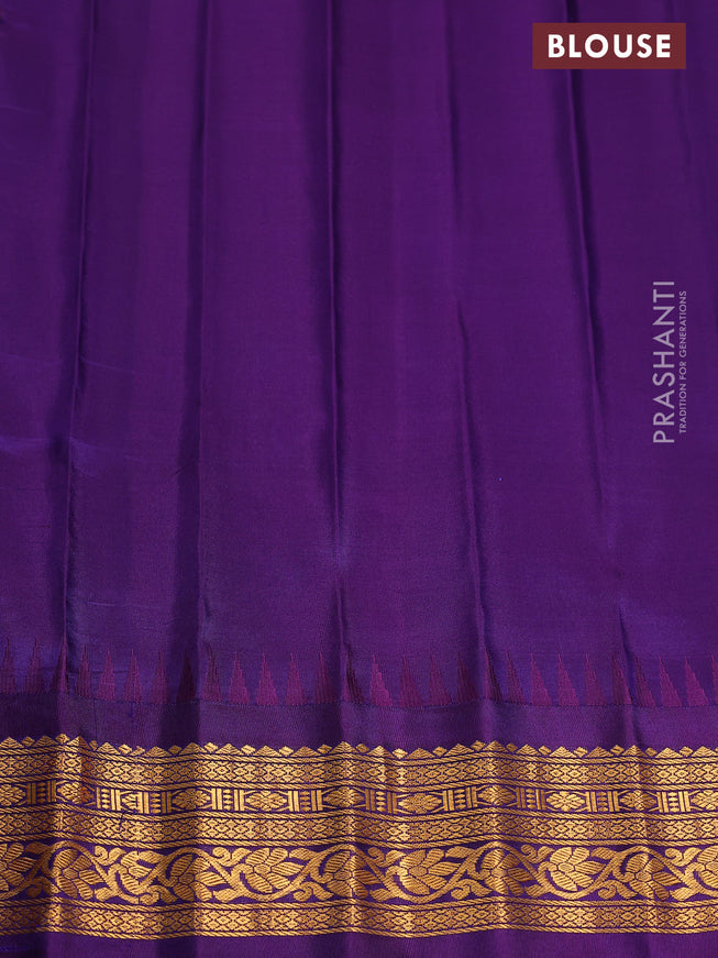Pure gadwal silk saree light blue and deep violet with zari woven buttas and temple design zari woven border