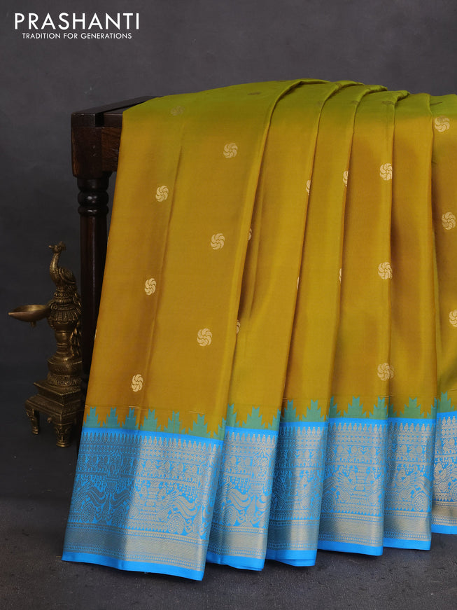 Pure gadwal silk saree mustard green and cs blue with zari woven buttas and temple design zari woven border