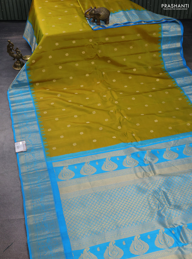 Pure gadwal silk saree mustard green and cs blue with zari woven buttas and temple design zari woven border