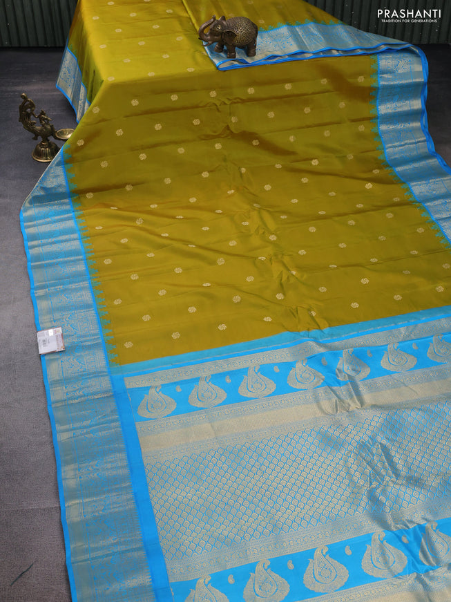 Pure gadwal silk saree mustard green and cs blue with zari woven buttas and temple design zari woven border