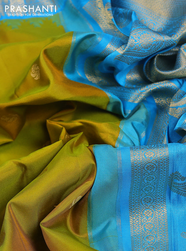 Pure gadwal silk saree mustard green and cs blue with zari woven buttas and temple design zari woven border