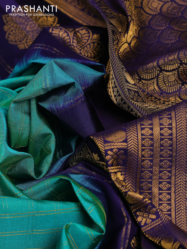 Pure gadwal silk saree green and navy blue with allover zari checked pattern and temple design zari woven border