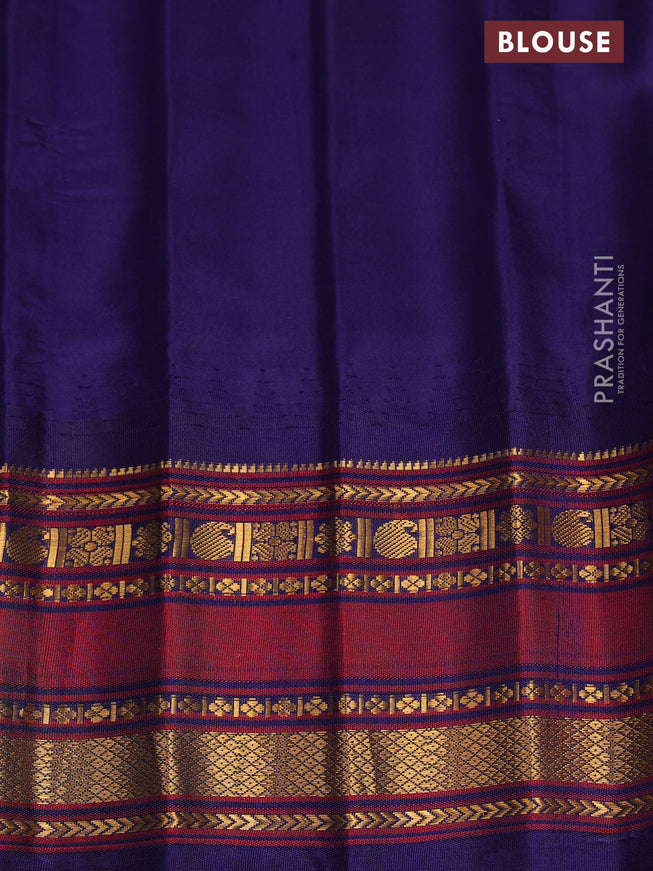 Pure gadwal silk saree green and navy blue with allover zari checked pattern and temple design zari woven border