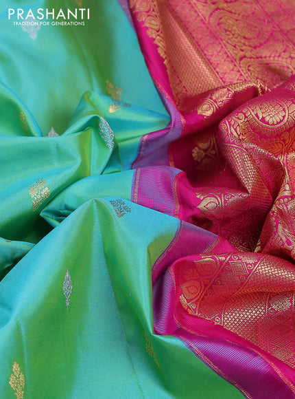 Pure gadwal silk saree dual shade of teal green and pink with zari woven buttas and temple design zari woven border