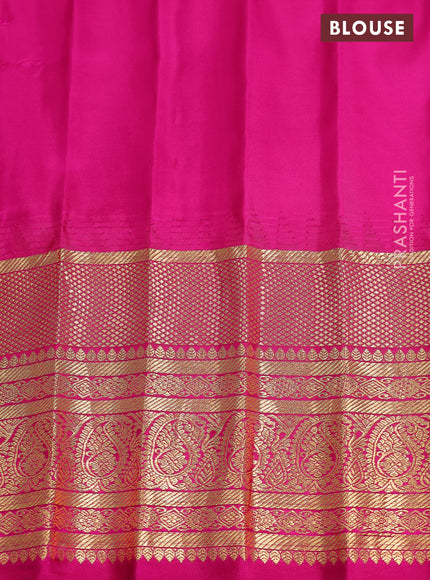 Pure gadwal silk saree dual shade of teal green and pink with zari woven buttas and temple design zari woven border