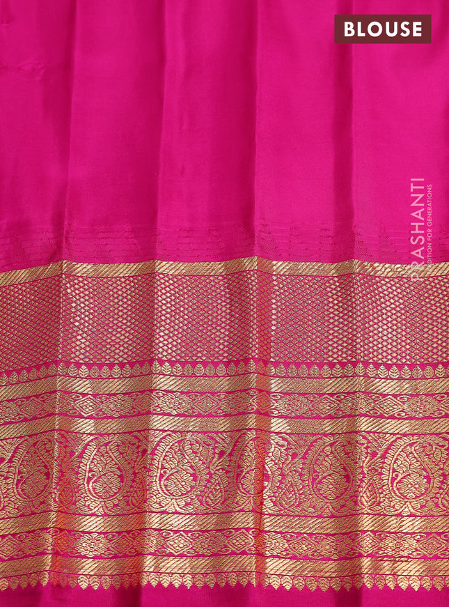 Pure gadwal silk saree dual shade of teal green and pink with zari woven buttas and temple design zari woven border