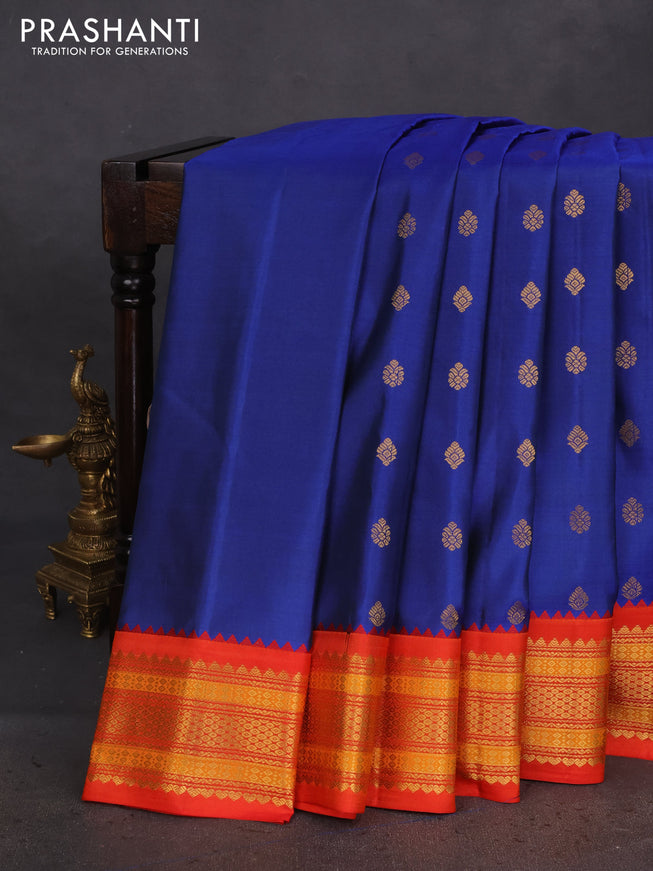 Pure gadwal silk saree dual shade of blue and orange with zari woven buttas and zari woven korvai border