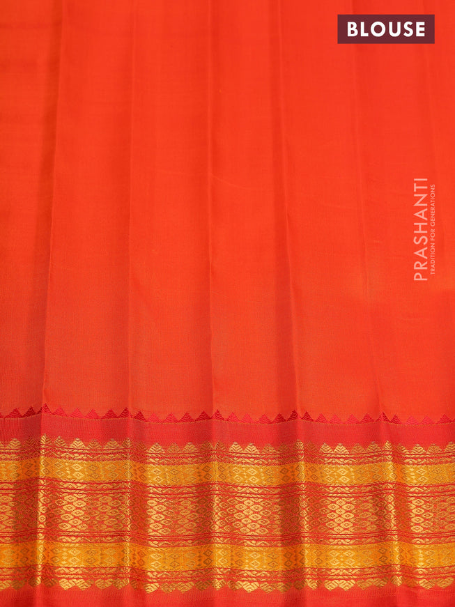Pure gadwal silk saree dual shade of blue and orange with zari woven buttas and zari woven korvai border