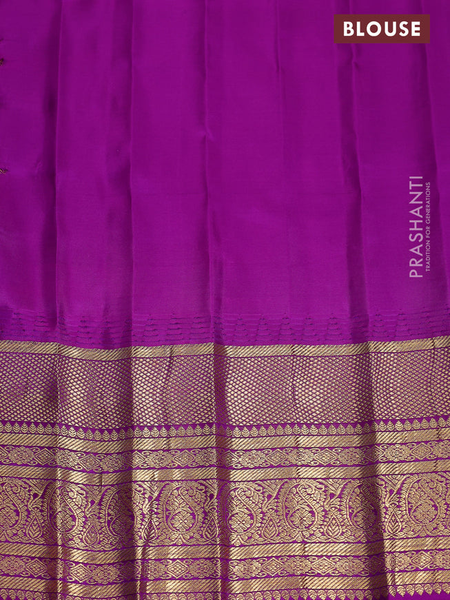 Pure gadwal silk saree peach pink and deep purple with zari woven buttas and temple design zari woven border