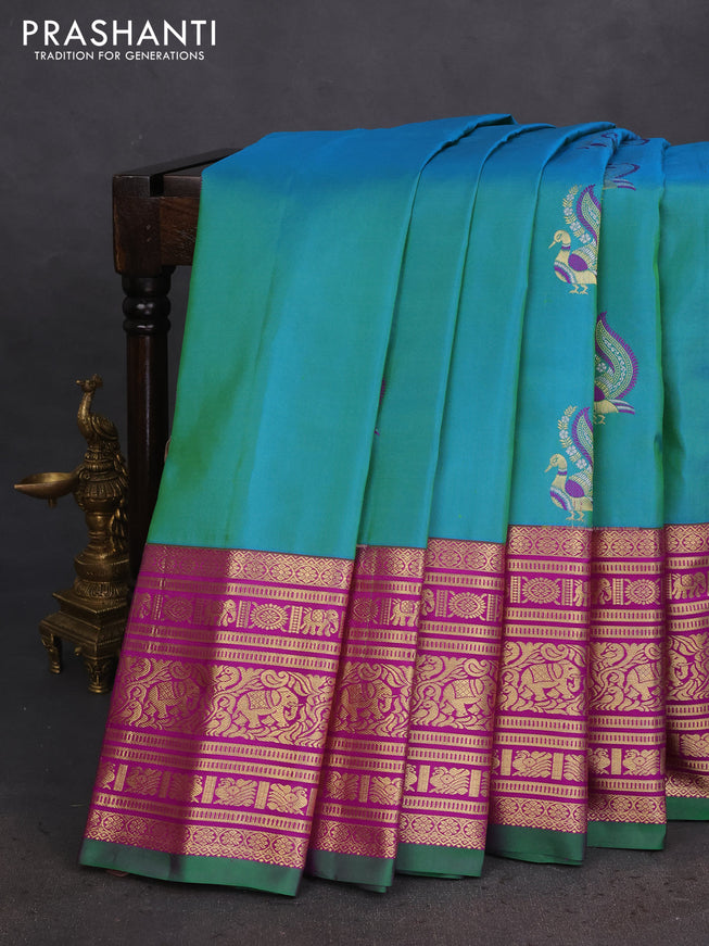 Pure gadwal silk saree dual shade of teal green and purple with annam zari woven border and long zari woven border