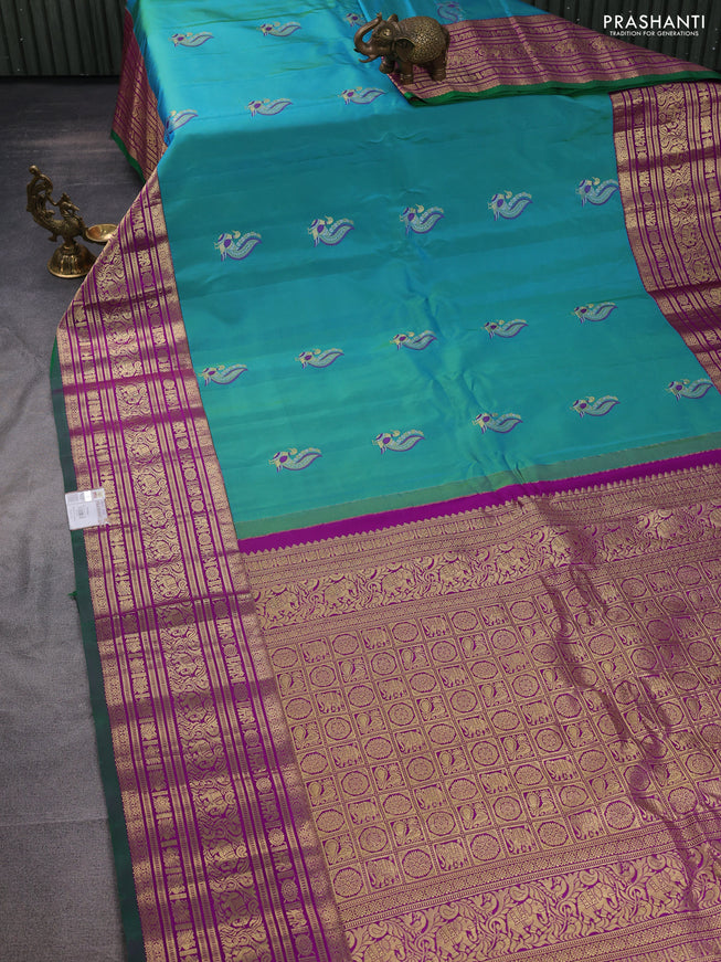 Pure gadwal silk saree dual shade of teal green and purple with annam zari woven border and long zari woven border