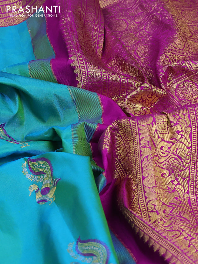 Pure gadwal silk saree dual shade of teal green and purple with annam zari woven border and long zari woven border