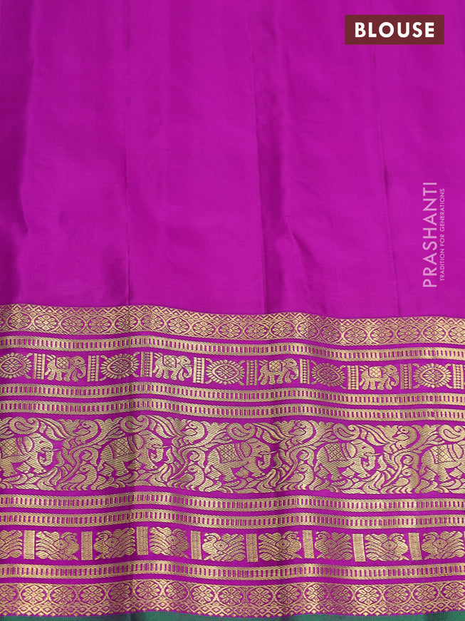 Pure gadwal silk saree dual shade of teal green and purple with annam zari woven border and long zari woven border