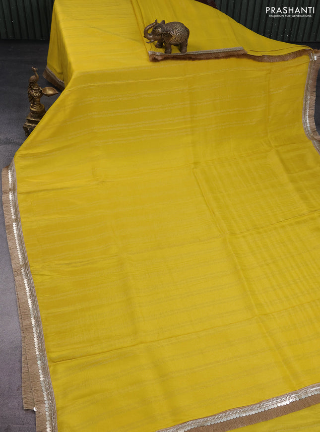 Banarasi tissue saree yellow and red with zari stripes pattern and lace work border