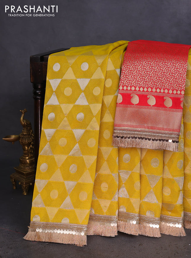 Banarasi tissue saree mustard yellow and red with allover zari woven geometric wevaes and lace work border