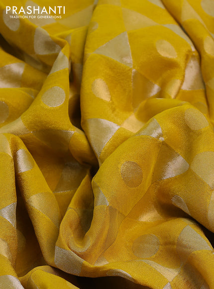 Banarasi tissue saree mustard yellow and red with allover zari woven geometric wevaes and lace work border