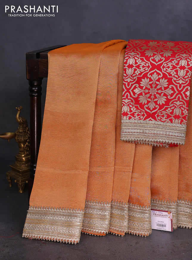 Banarasi tissue saree rust shade and red with plain body and lace work border