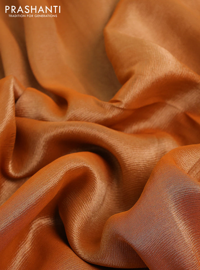 Banarasi tissue saree rust shade and red with plain body and lace work border