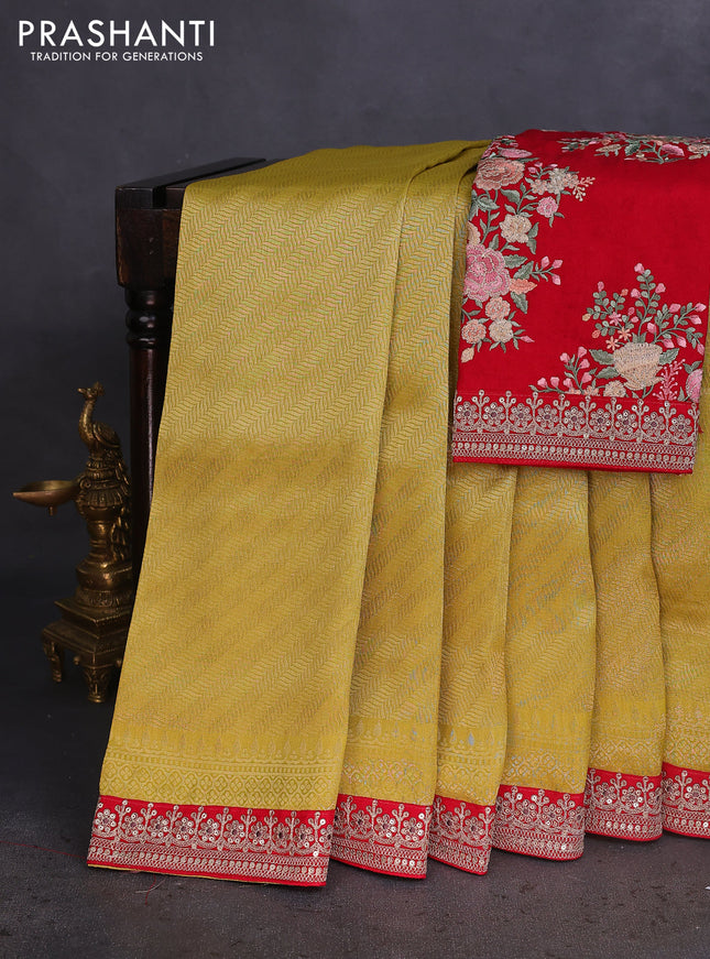 Banarasi tissue saree lime green and red with allover zari woven brocade weaves and sequin work border