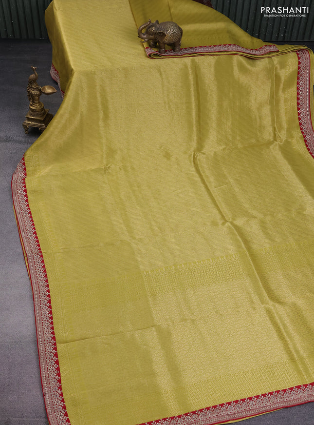 Banarasi tissue saree lime green and red with allover zari woven brocade weaves and sequin work border