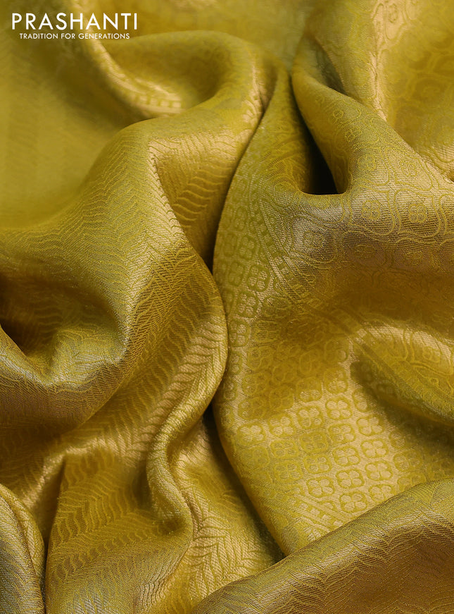 Banarasi tissue saree lime green and red with allover zari woven brocade weaves and sequin work border