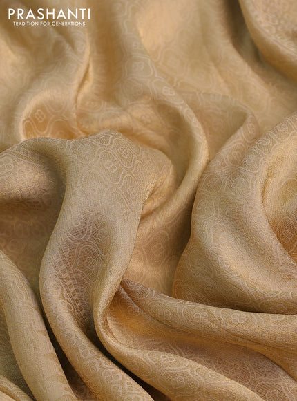 Banarasi tissue saree beige and red with allover zari woven brocade weaves and sequin work border