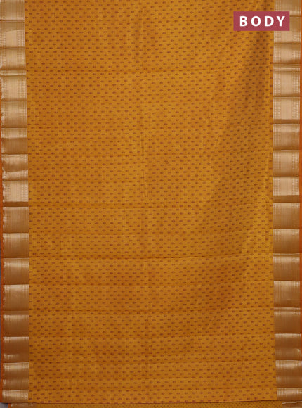 Semi raw silk saree mustard yellow with butta prints and zari woven border