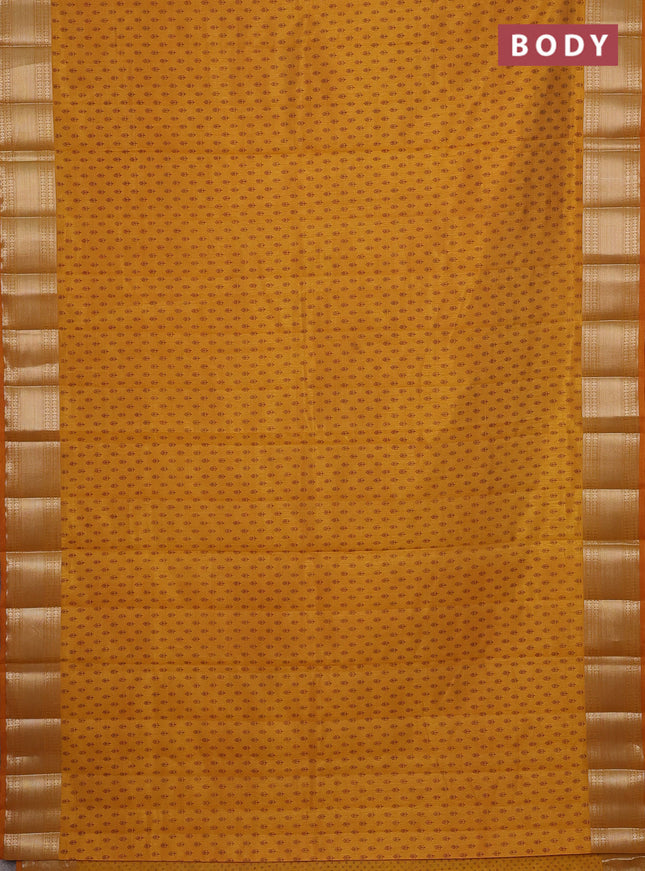 Semi raw silk saree mustard yellow with butta prints and zari woven border