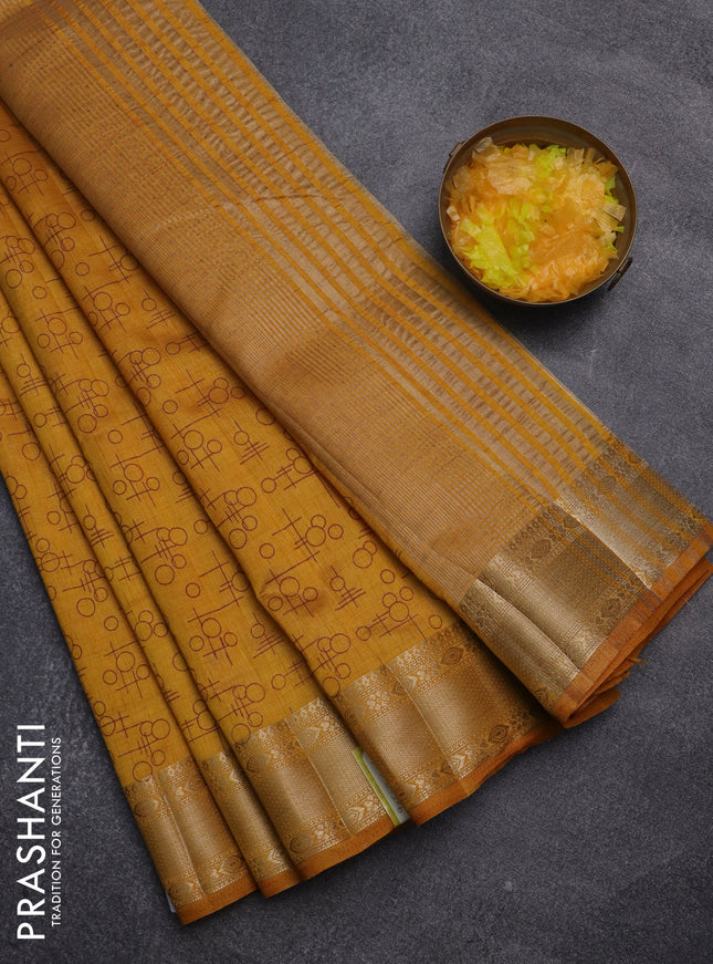Semi raw silk saree mustard yellow with allover prints and zari woven border