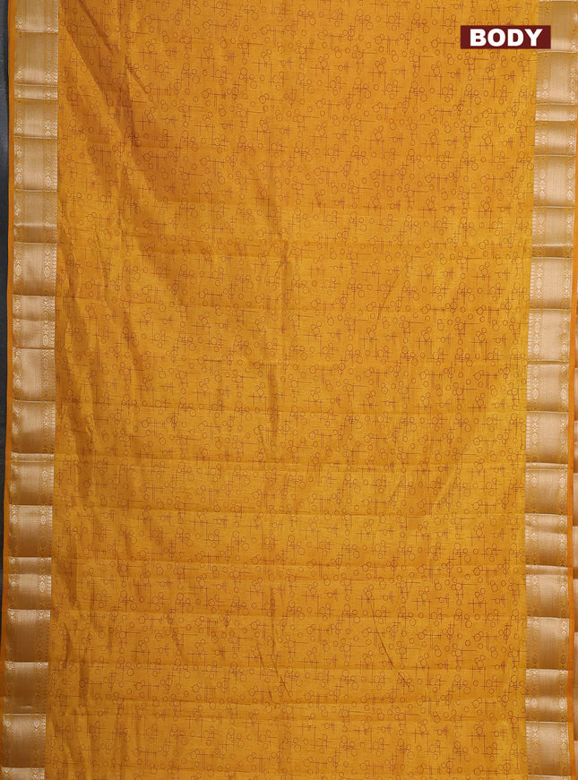 Semi raw silk saree mustard yellow with allover prints and zari woven border
