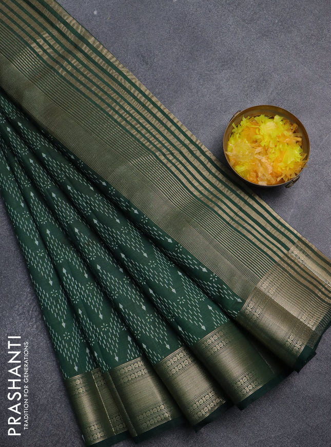 Semi raw silk saree bottle green with allover zig zag prints and zari woven border