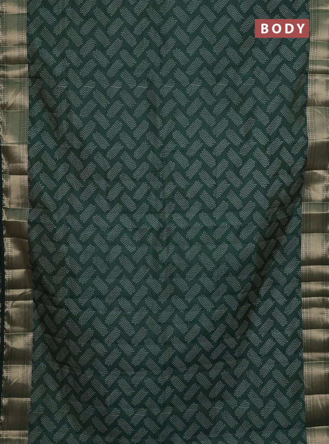 Semi raw silk saree bottle green with allover butta prints and zari woven border