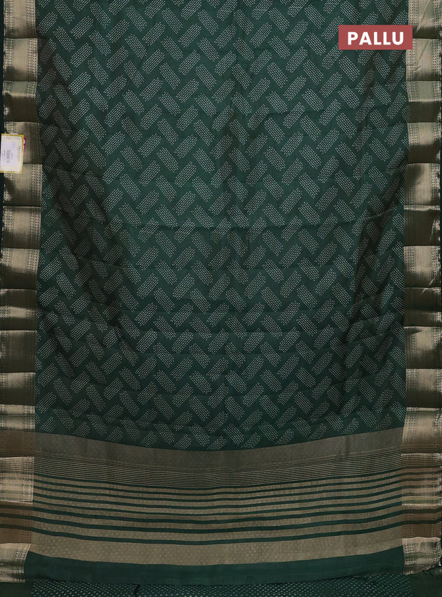 Semi raw silk saree bottle green with allover butta prints and zari woven border